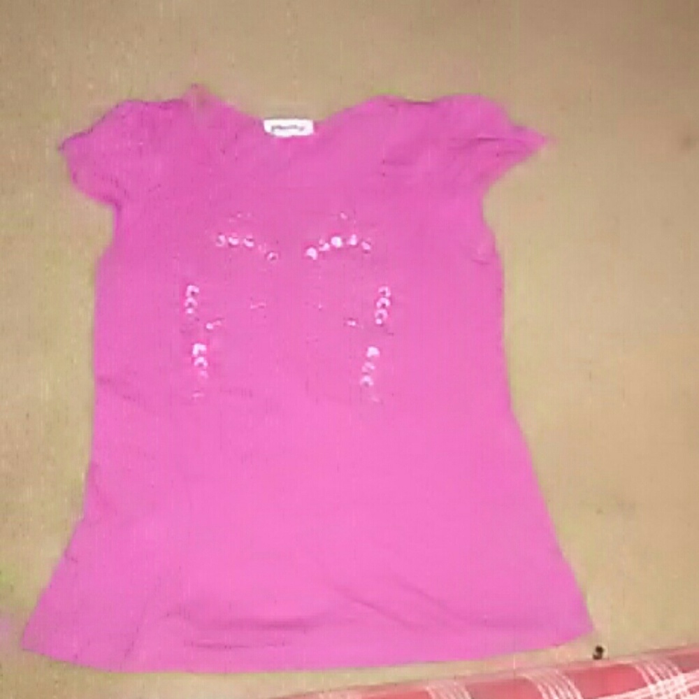 Cute pink top with butterfly design